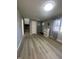 Bright, neutral living room featuring new floors and a welcoming entrance at 3413 Ivory Way, Indianapolis, IN 46227