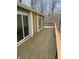 A wooden deck with great open space and railings for enjoying the outdoors on any day at 3764 E Glenwood Dr, Martinsville, IN 46151