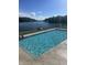 Community pool with clear water, perfect for relaxation with a beautiful view of the surrounding lake at 3764 E Glenwood Dr, Martinsville, IN 46151
