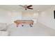 Open bonus room featuring a pool table and comfortable seating area at 3789 Shady Pointe Row, Greenwood, IN 46143