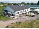 Aerial view of a community event space with outdoor seating and landscaping at 3789 Shady Pointe Row, Greenwood, IN 46143