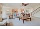 Open living room featuring hardwood floors, plush sofas, and an abundance of natural light at 3789 Shady Pointe Row, Greenwood, IN 46143