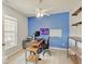 Inviting home office with a blue accent wall, white trim, and natural light, perfect for working from home at 3789 Shady Pointe Row, Greenwood, IN 46143