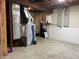 Basement utility room showing a furnace, water heater, and electrical boxes at 415 N Westview Dr, Columbus, IN 47201