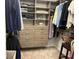 Organized closet with built-in shelving, drawers, and hanging rods providing ample storage space at 415 N Westview Dr, Columbus, IN 47201
