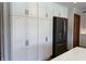Elegant kitchen featuring custom white cabinets, a modern stainless steel refrigerator at 415 N Westview Dr, Columbus, IN 47201
