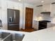 Bright kitchen with granite countertops, modern appliances, and stainless steel sink at 415 N Westview Dr, Columbus, IN 47201