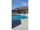 Outdoor pool area with spacious patio and seating, perfect for entertaining at 415 N Westview Dr, Columbus, IN 47201