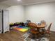 Recreation room complete with a dining set, toy shelves, and a colorful playmat at 415 N Westview Dr, Columbus, IN 47201