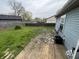 This backyard has grass and a deck at 4506 Phoenix Dr, Indianapolis, IN 46241