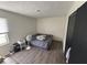 Bedroom featuring hardwood floors, a window, and a comfortable bed at 4506 Phoenix Dr, Indianapolis, IN 46241