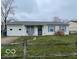 Charming single-story home featuring a well-maintained front yard and an attached garage at 4506 Phoenix Dr, Indianapolis, IN 46241