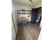 Practical laundry area featuring built-in shelves and space-saving design for added convenience at 4506 Phoenix Dr, Indianapolis, IN 46241