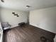 Bright living room featuring wood flooring and an open layout for versatile furniture arrangement options at 4506 Phoenix Dr, Indianapolis, IN 46241