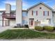 Charming two-story home with red shutters, attached garage, and small front yard at 4630 Kelvington Dr, Indianapolis, IN 46254