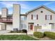 Charming two-story home with red shutters, attached garage, and small front yard at 4630 Kelvington Dr, Indianapolis, IN 46254