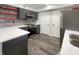 Stylish kitchen with stainless steel appliances, white countertops, and gray cabinets at 4630 Kelvington Dr, Indianapolis, IN 46254