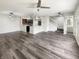 Bright living space featuring hardwood floors, neutral walls, and an open floor plan at 4630 Kelvington Dr, Indianapolis, IN 46254