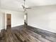 Large main bedroom with hardwood floors, and ensuite bathroom at 4630 Kelvington Dr, Indianapolis, IN 46254