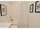 Bright bathroom featuring a shower/tub combo and a framed Los Angeles art piece at 5181 Golden Grove Dr, McCordsville, IN 46055