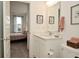 Bathroom with white vanity, quartz countertops, and a view into the bedroom at 5181 Golden Grove Dr, McCordsville, IN 46055
