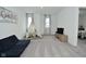 Spacious bonus room featuring neutral walls, plush carpeting, and natural light from the two windows at 5181 Golden Grove Dr, McCordsville, IN 46055