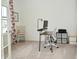 Bright home office with carpet, desk, chair and natural light at 5181 Golden Grove Dr, McCordsville, IN 46055