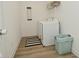Functional laundry room with a washer and dryer, shelving and black and white rug at 5181 Golden Grove Dr, McCordsville, IN 46055