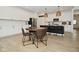 Open concept home design featuring kitchen island, dining area and great room at 5181 Golden Grove Dr, McCordsville, IN 46055