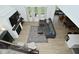 Aerial perspective of the living room showcasing the fireplace and sectional sofa at 5181 Golden Grove Dr, McCordsville, IN 46055