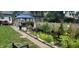 Backyard garden with a lovely pond, gazebo, and lush vegetation, ideal for relaxation and outdoor enjoyment at 52 N Oakland Ave, Indianapolis, IN 46201