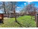 Well-manicured backyard with a cozy gazebo area and mature trees at 52 N Oakland Ave, Indianapolis, IN 46201