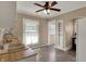 Eat-in kitchen features an arched entry, ceiling fan, and an abundance of natural light at 52 N Oakland Ave, Indianapolis, IN 46201