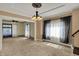 Living room with natural light, decorative ceilings, and original trim at 52 N Oakland Ave, Indianapolis, IN 46201