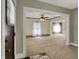 Open living area showcasing neutral paint, trim and carpet at 52 N Oakland Ave, Indianapolis, IN 46201