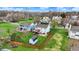 Aerial view of landscaped backyard with patio, deck, shed, and privacy fence at 5223 Jerry Ct, Indianapolis, IN 46254
