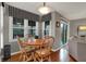 Cozy dining area filled with light from valanced windows at 5223 Jerry Ct, Indianapolis, IN 46254