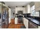 Bright kitchen features stainless steel appliances, including a double oven and refrigerator at 5223 Jerry Ct, Indianapolis, IN 46254