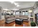 Spacious living room with comfortable seating and open flow to kitchen and dining at 5223 Jerry Ct, Indianapolis, IN 46254