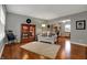 Comfortable living room showcasing hardwood floors, neutral tones, and stylish decor at 5223 Jerry Ct, Indianapolis, IN 46254