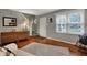 Cozy living room with hardwood floors, neutral walls, and plenty of natural light at 5223 Jerry Ct, Indianapolis, IN 46254