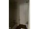 A dated bathroom with a tub, toilet, and no vanity is in need of renovation at 601 E Thompson St, Edinburgh, IN 46124