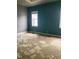 Bedroom with two-tone walls, two windows and damaged carpet at 601 E Thompson St, Edinburgh, IN 46124