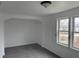 Bright bedroom with neutral carpet, clean lines and modern finishes at 608 N Gray St, Indianapolis, IN 46201