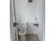 Compact powder room with modern fixtures, providing convenience for guests at 608 N Gray St, Indianapolis, IN 46201