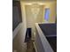 Hallway showing a modern chandelier at 6120 Salanie Pl, Indianapolis, IN 46254