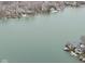 Panoramic aerial view of lakefront homes and docks along the tranquil shores at 6599 Meadowlark Dr, Nineveh, IN 46164