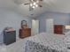 Bedroom with carpet, vaulted ceiling, ceiling fan, and an en suite bathroom at 6599 Meadowlark Dr, Nineveh, IN 46164