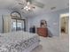 Bedroom with carpet, vaulted ceiling and a sliding glass door leading to a deck at 6599 Meadowlark Dr, Nineveh, IN 46164
