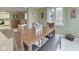Bright dining area features a window with natural light and access to the kitchen at 6599 Meadowlark Dr, Nineveh, IN 46164